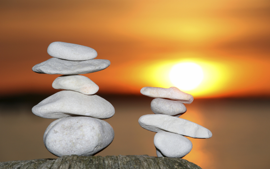 Maureen Kane mental Health Counseling Therapy Bellingham WA.  photo: Rocks stacked with sunset behind
